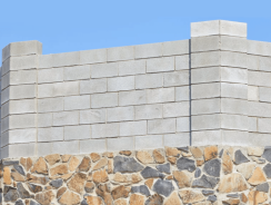 Comment construire un mur de clôture en parpaing : guide complet 2024
